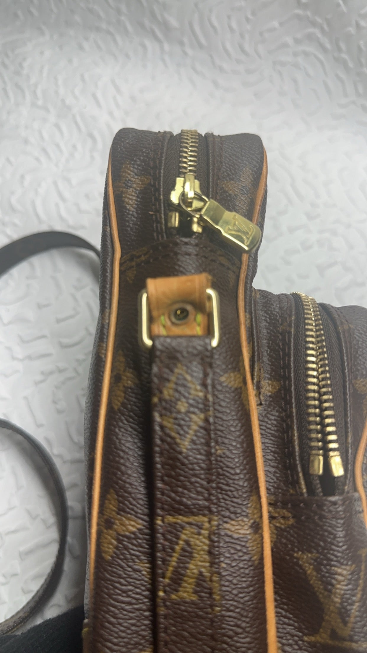 Missing one rivette, does not effect strap