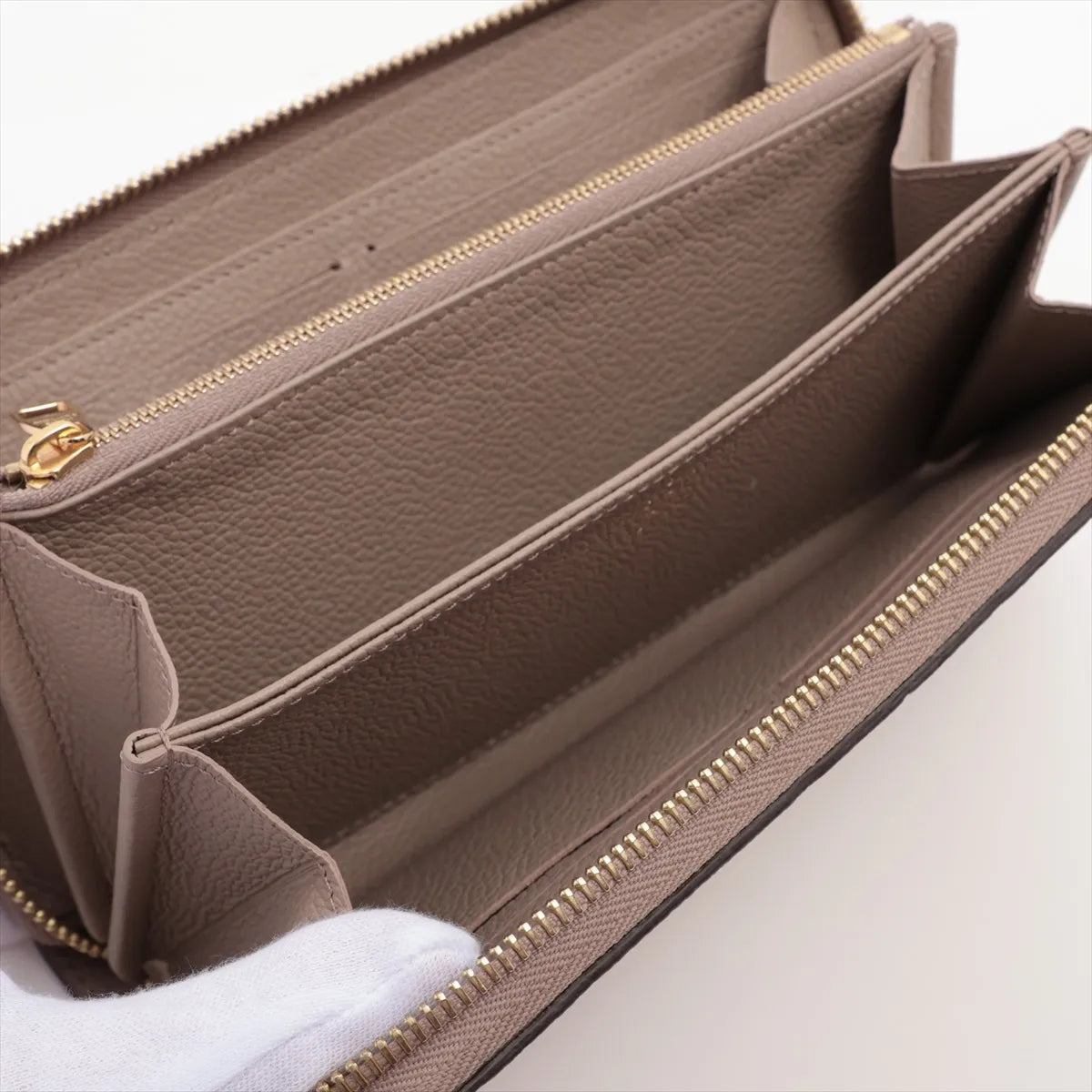 Available Louis Vuitton monogram empreinte Zippy Wallet M69034 True Trail Zip Round Wallet