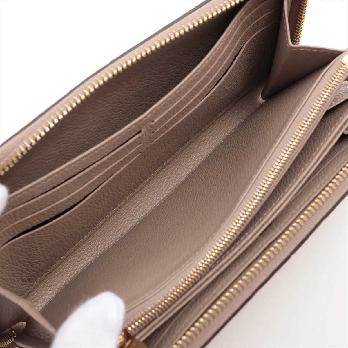 Available Louis Vuitton monogram empreinte Zippy Wallet M69034 True Trail Zip Round Wallet