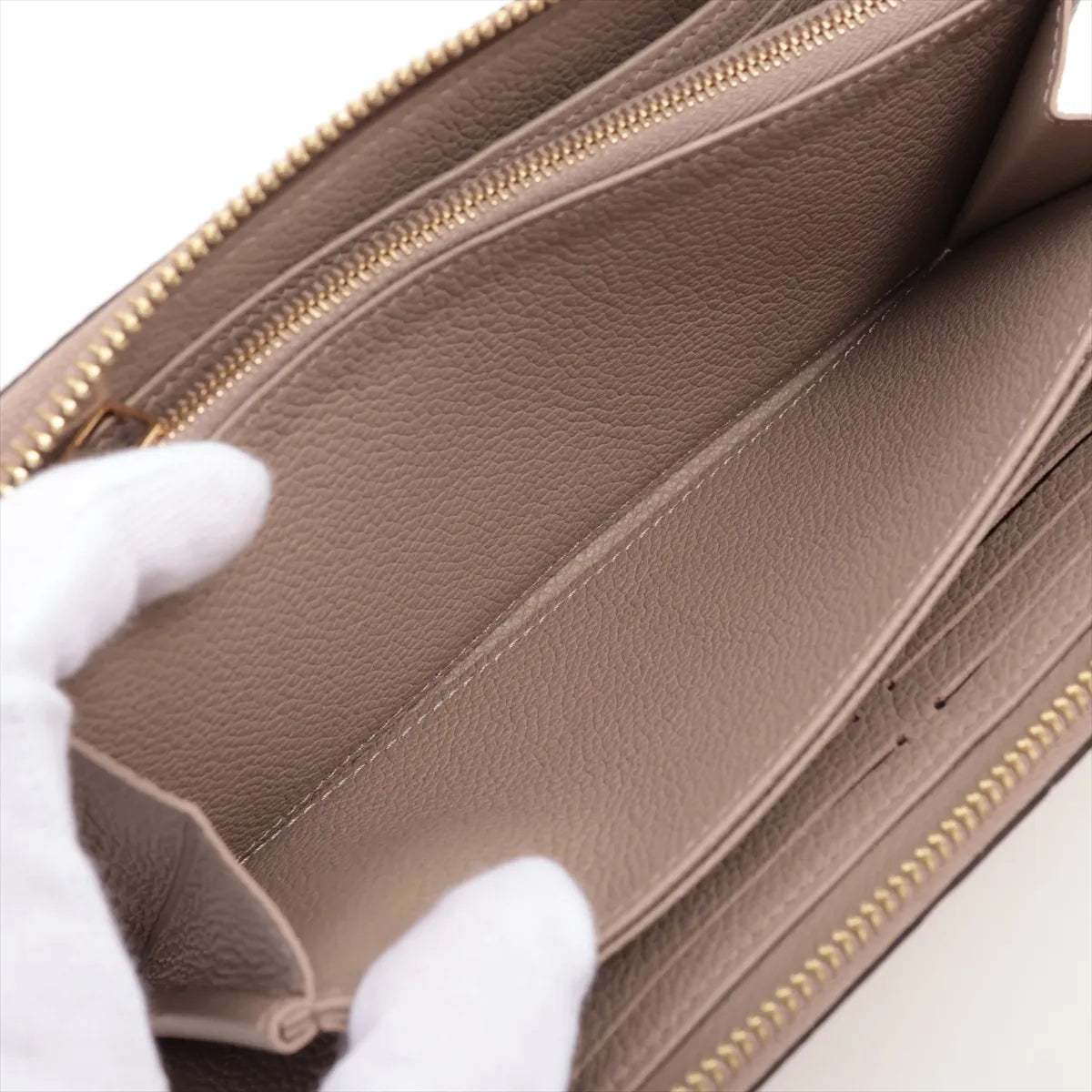 Available Louis Vuitton monogram empreinte Zippy Wallet M69034 True Trail Zip Round Wallet