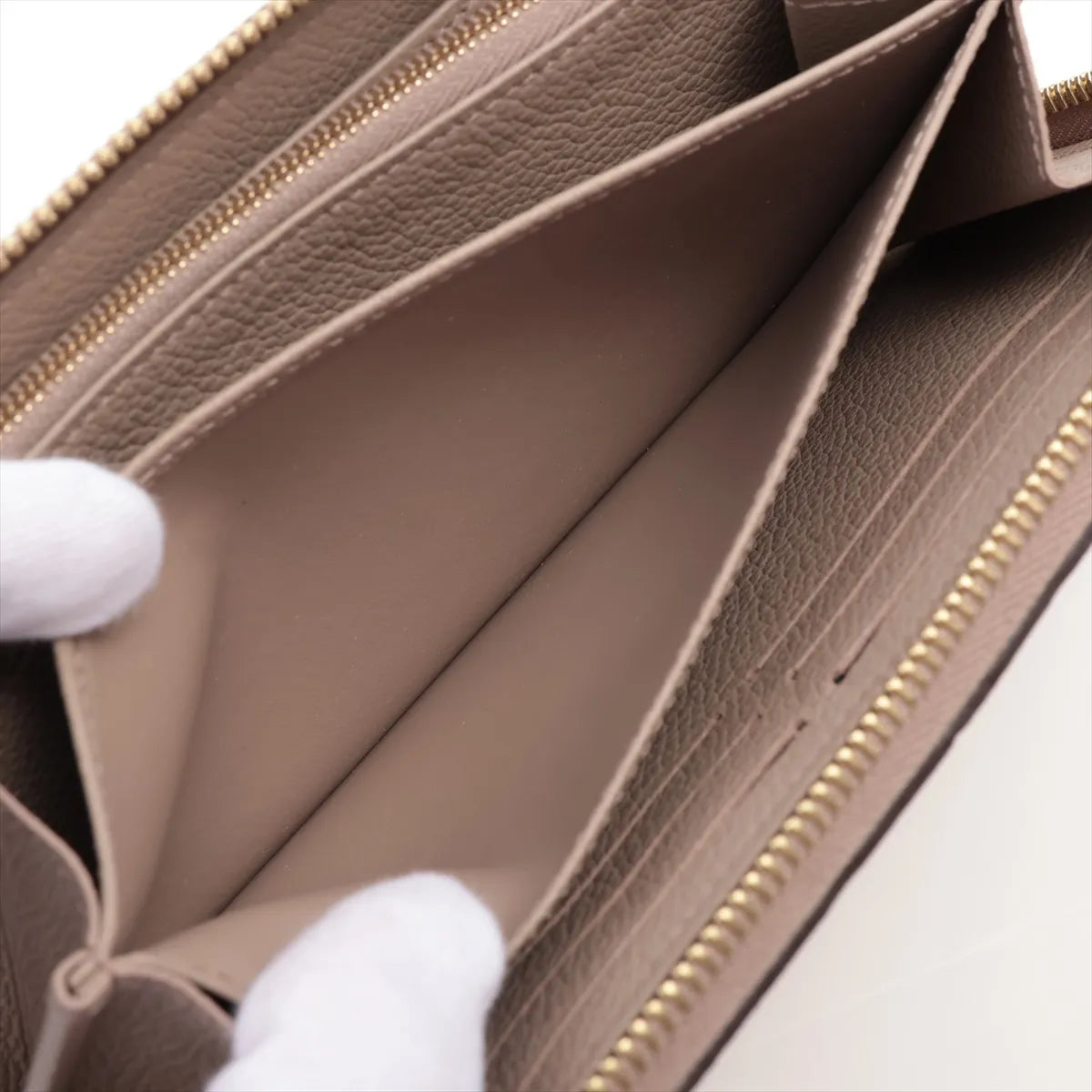 Available Louis Vuitton monogram empreinte Zippy Wallet M69034 True Trail Zip Round Wallet