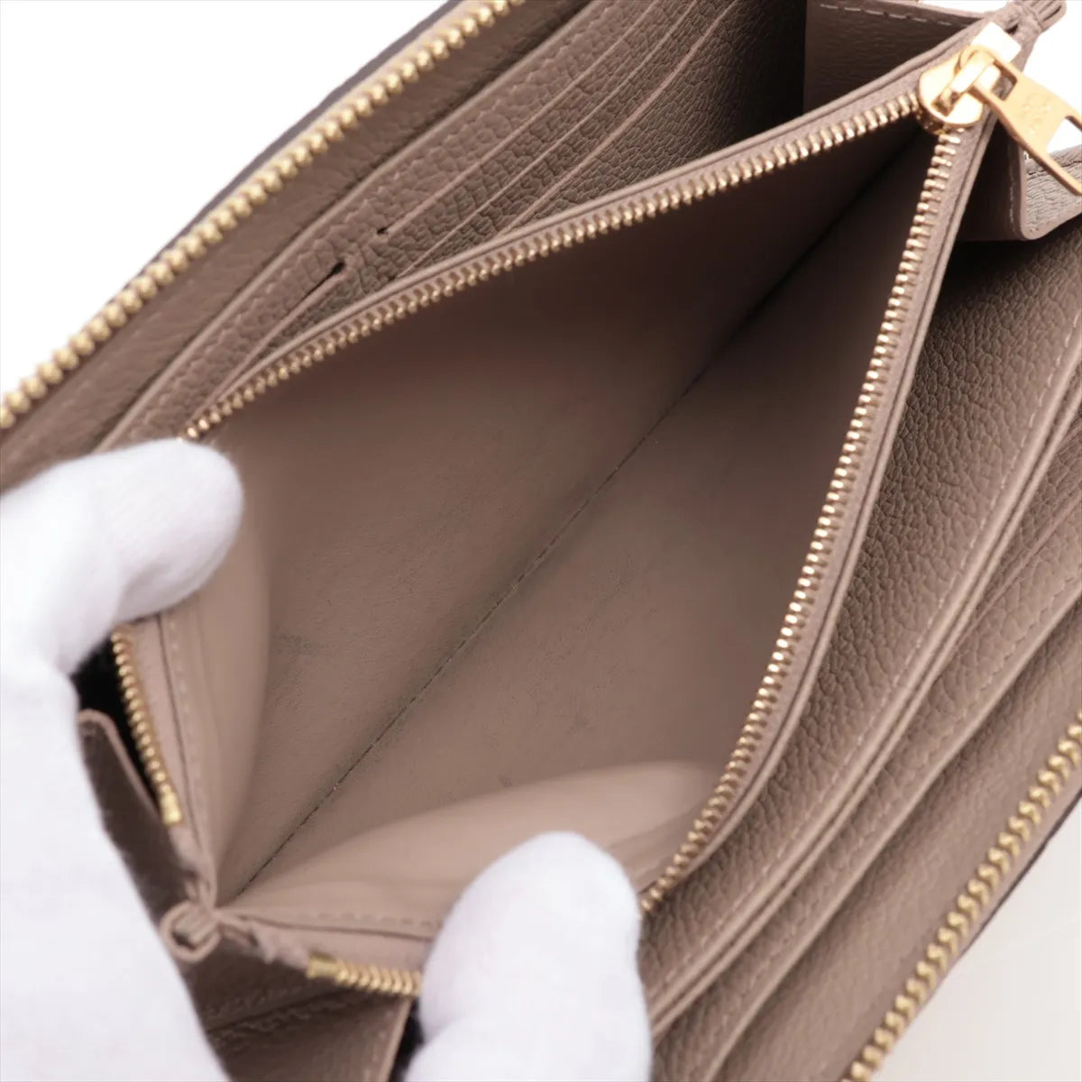 Available Louis Vuitton monogram empreinte Zippy Wallet M69034 True Trail Zip Round Wallet