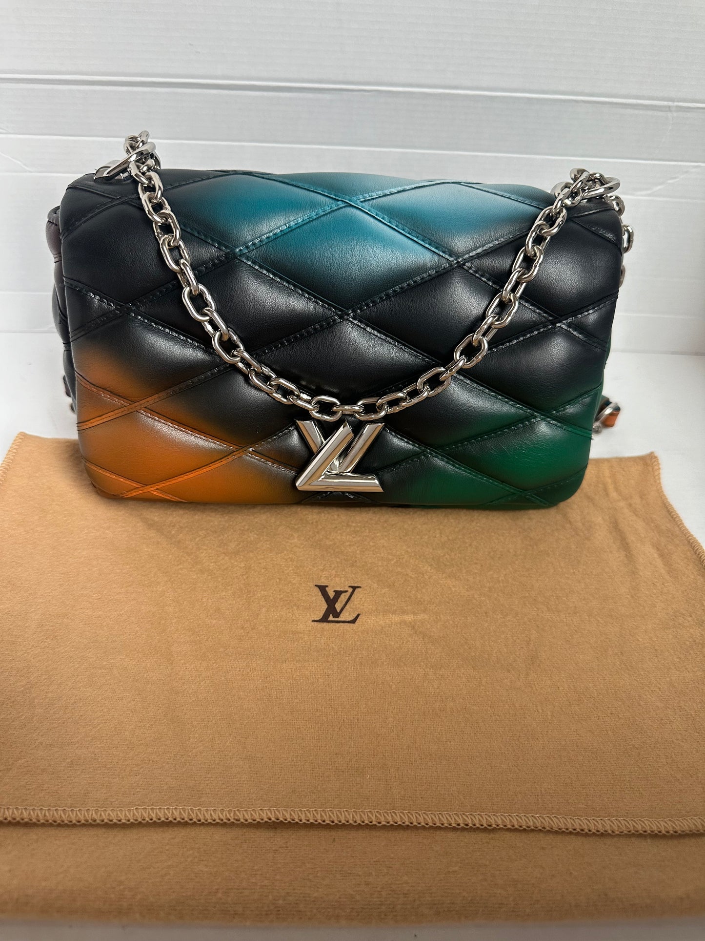 Available Louis Vuitton twist lock Puff GO 14 PM