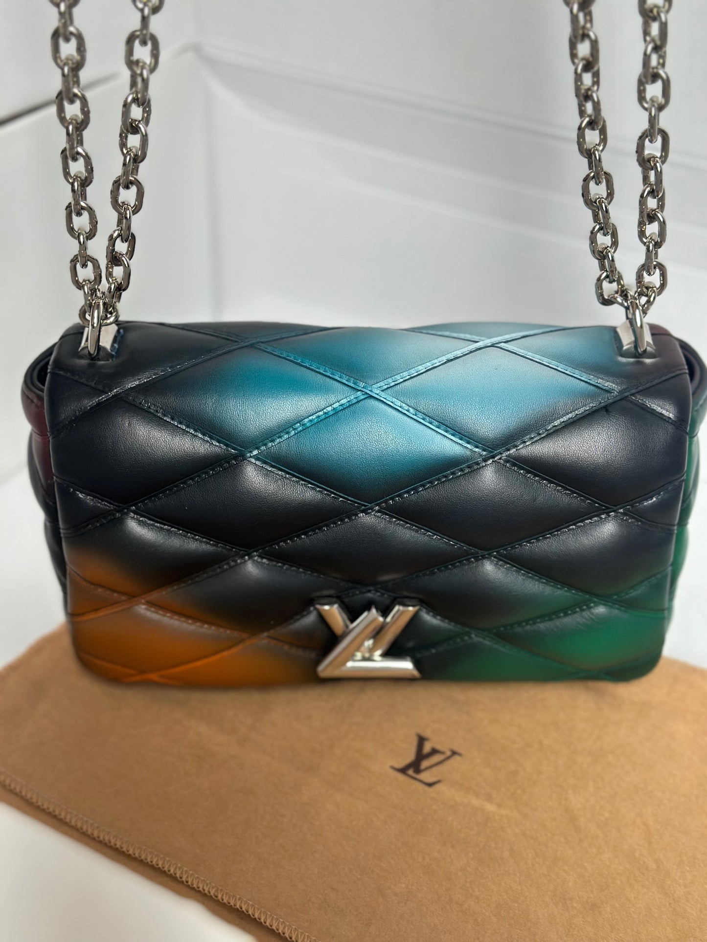 Available Louis Vuitton twist lock Puff GO 14 PM