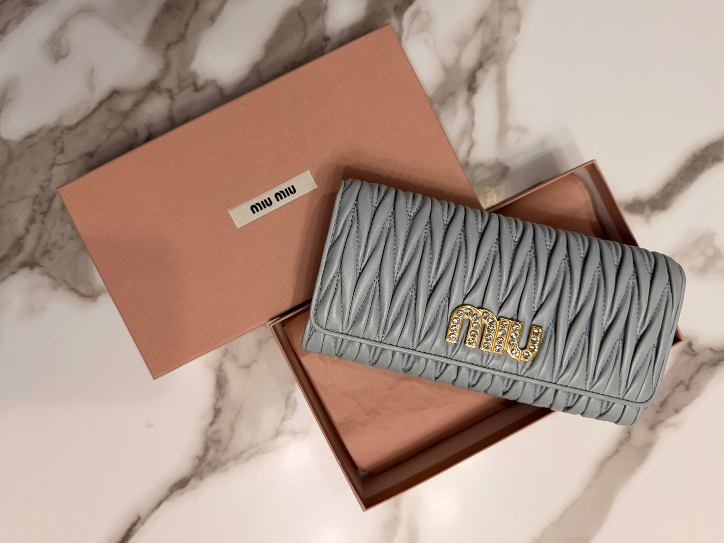 Available Miu Miu Matelasse Bifold Long Wallet Logo Leather Cielo Blue