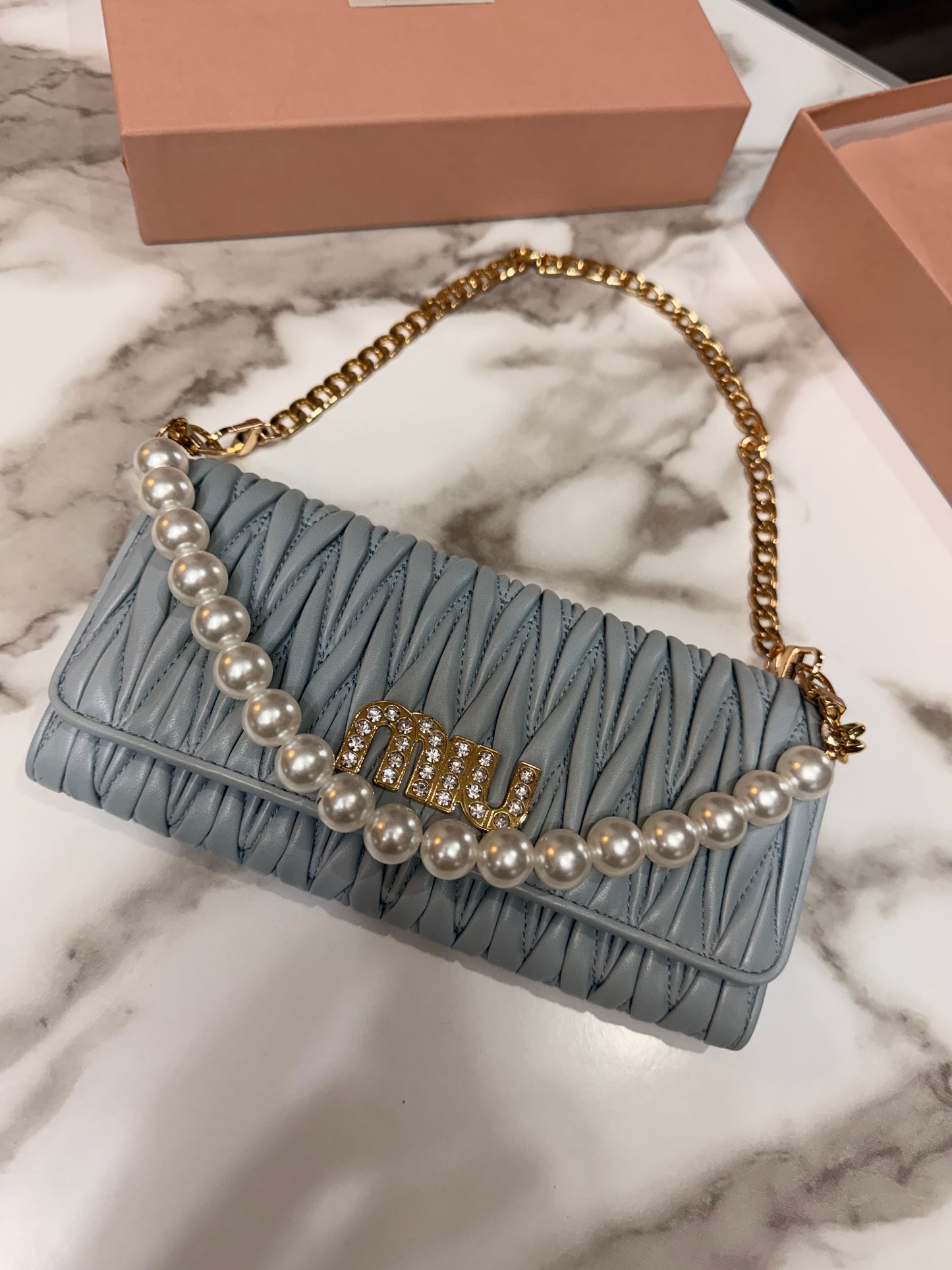 Available Miu Miu Matelasse Bifold Long Wallet Logo Leather Cielo Blue