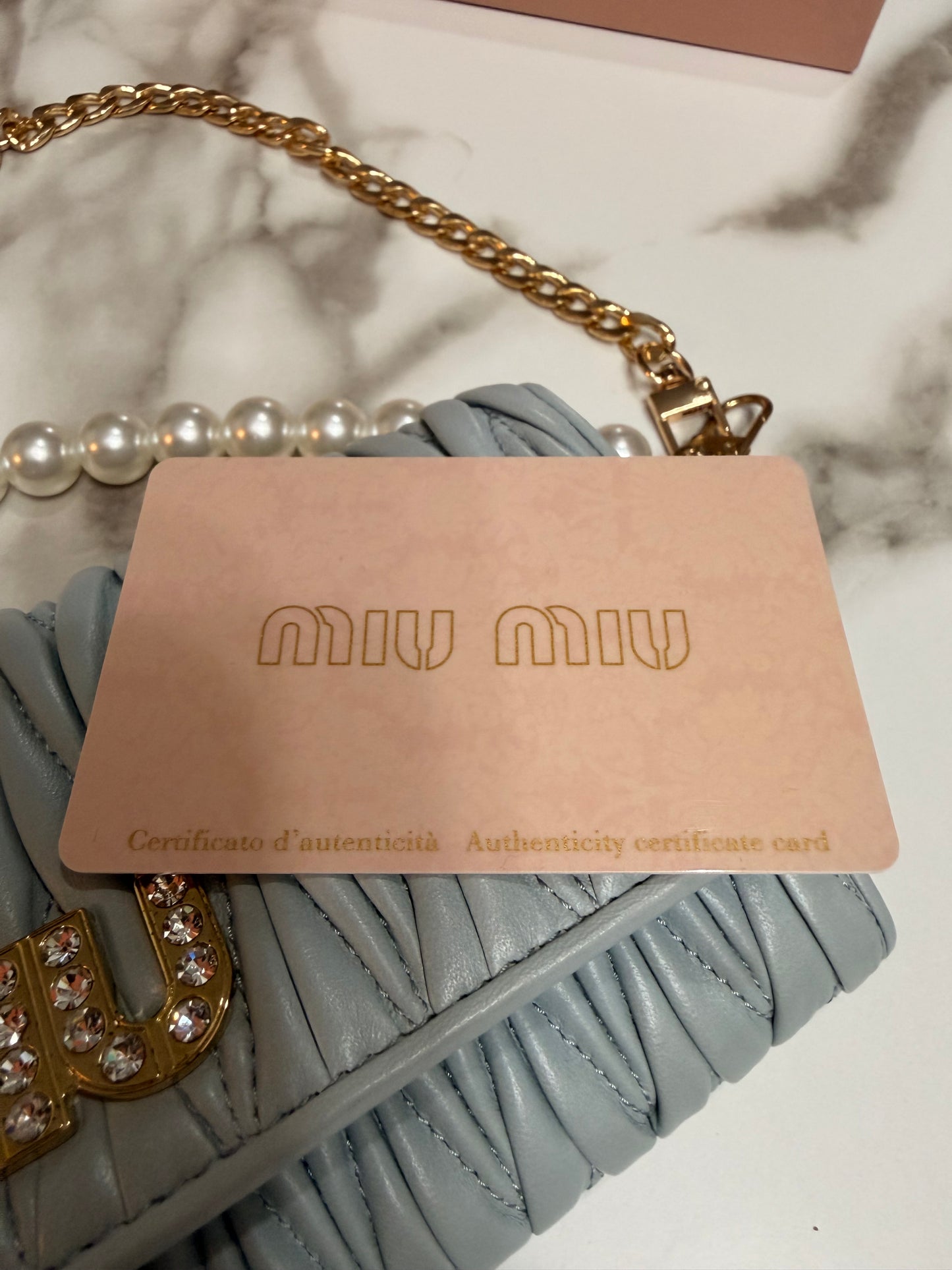 Available Miu Miu Matelasse Bifold Long Wallet Logo Leather Cielo Blue