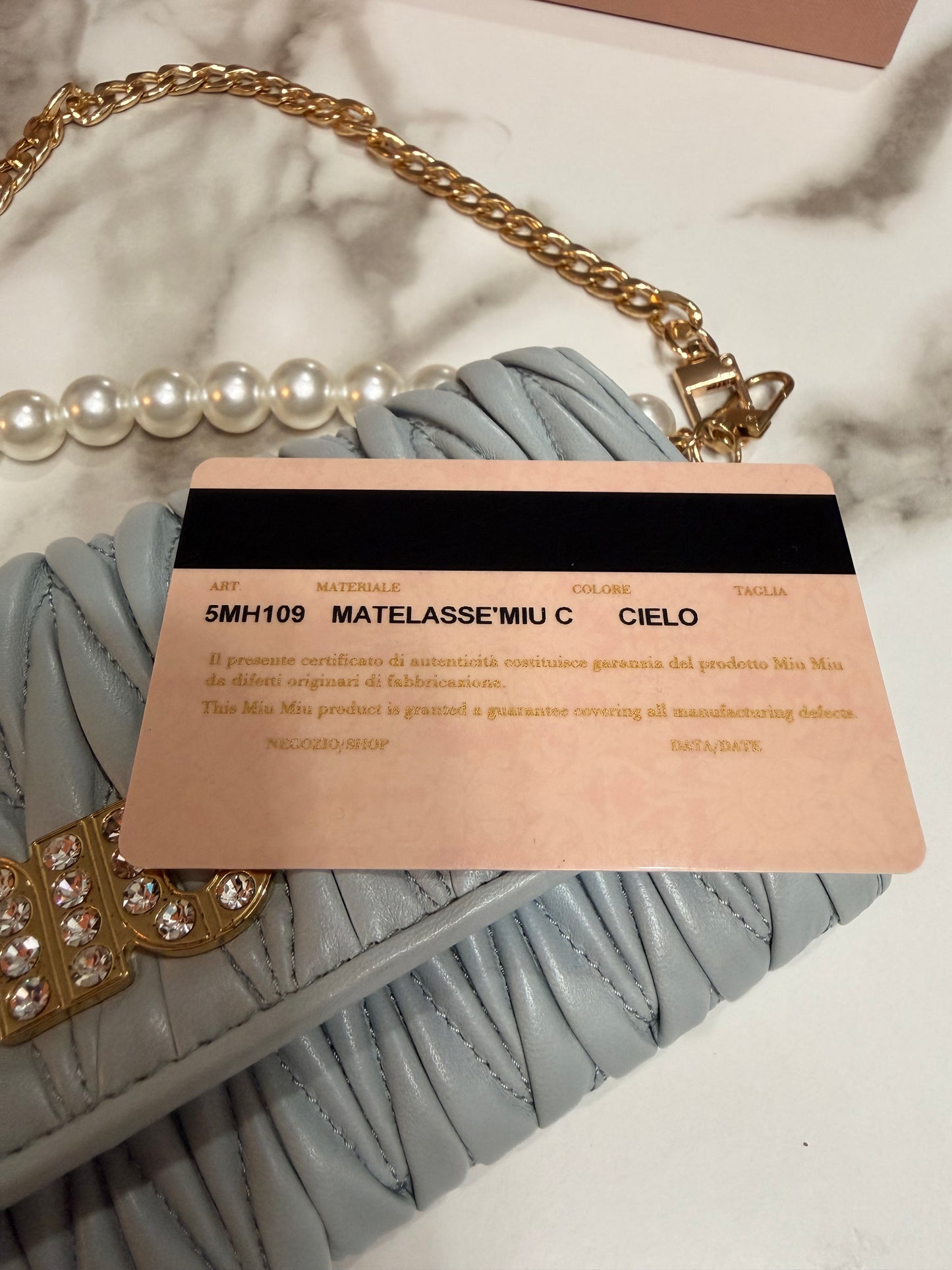 Available Miu Miu Matelasse Bifold Long Wallet Logo Leather Cielo Blue