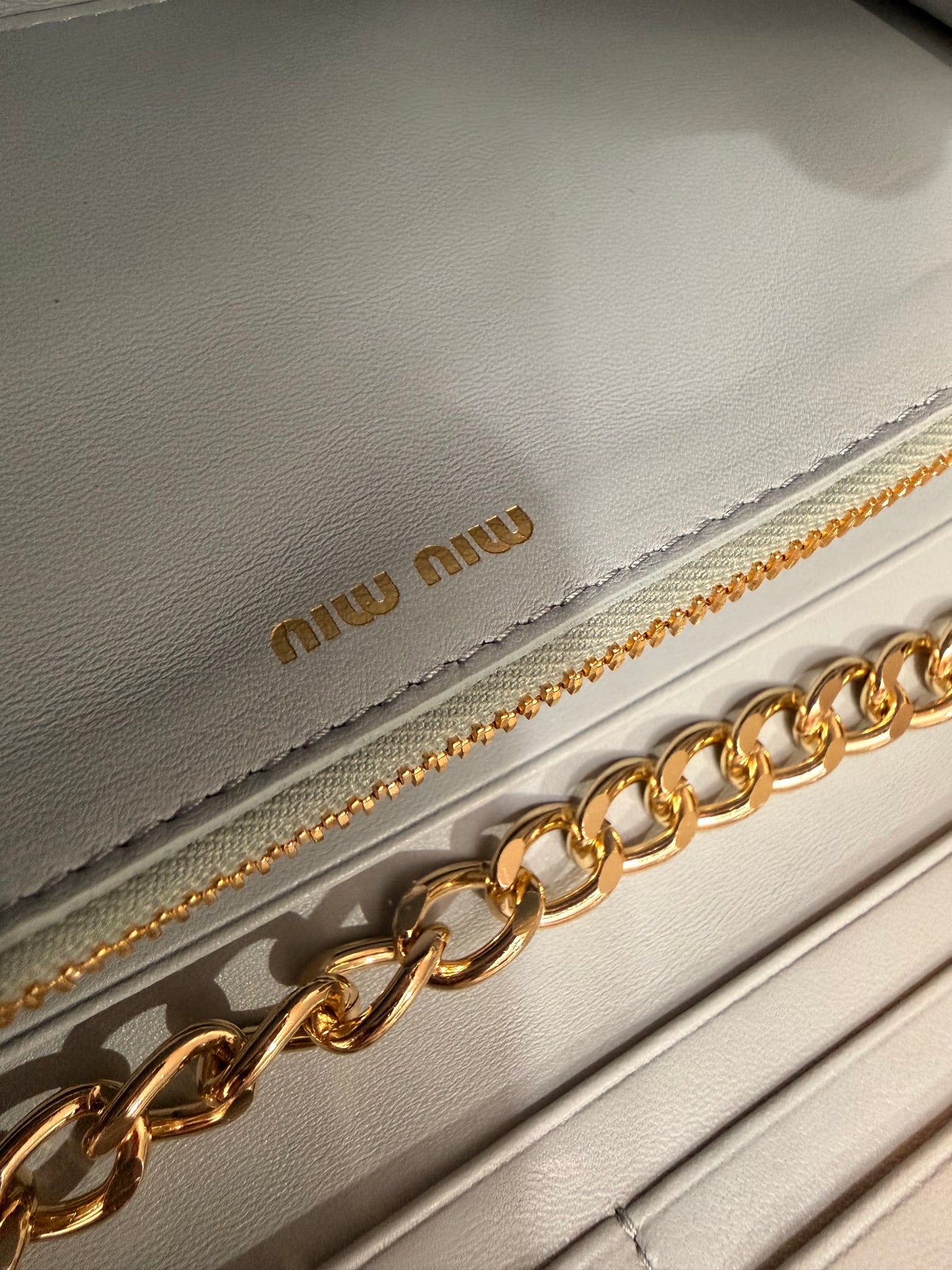 Available Miu Miu Matelasse Bifold Long Wallet Logo Leather Cielo Blue