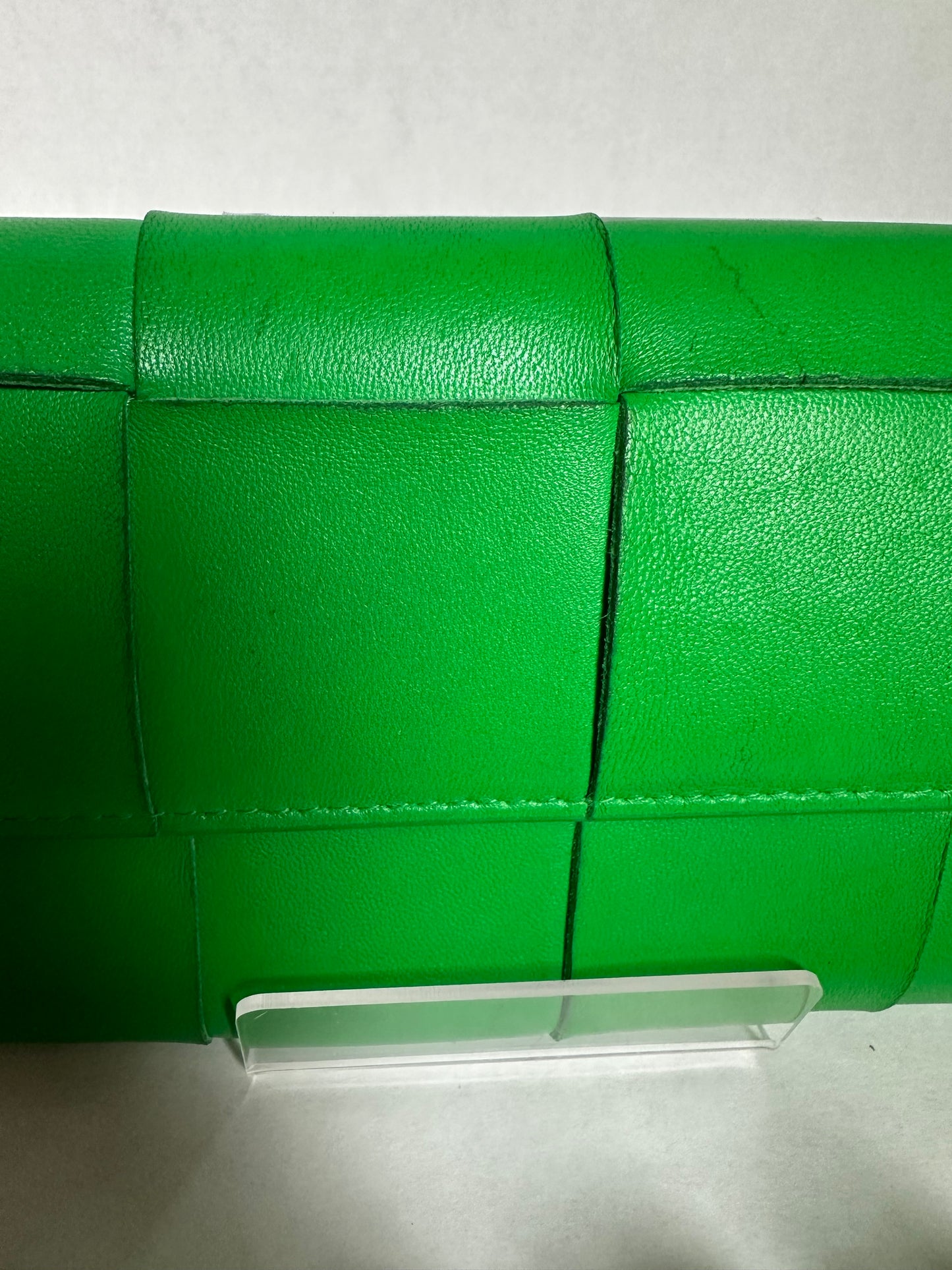 Available Bottega Veneta Cassette Intrecciato green in color