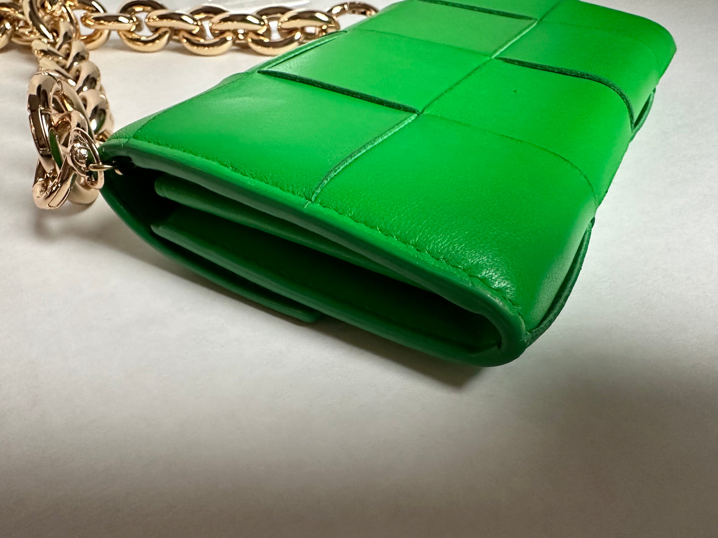 Available Bottega Veneta Cassette Intrecciato green in color