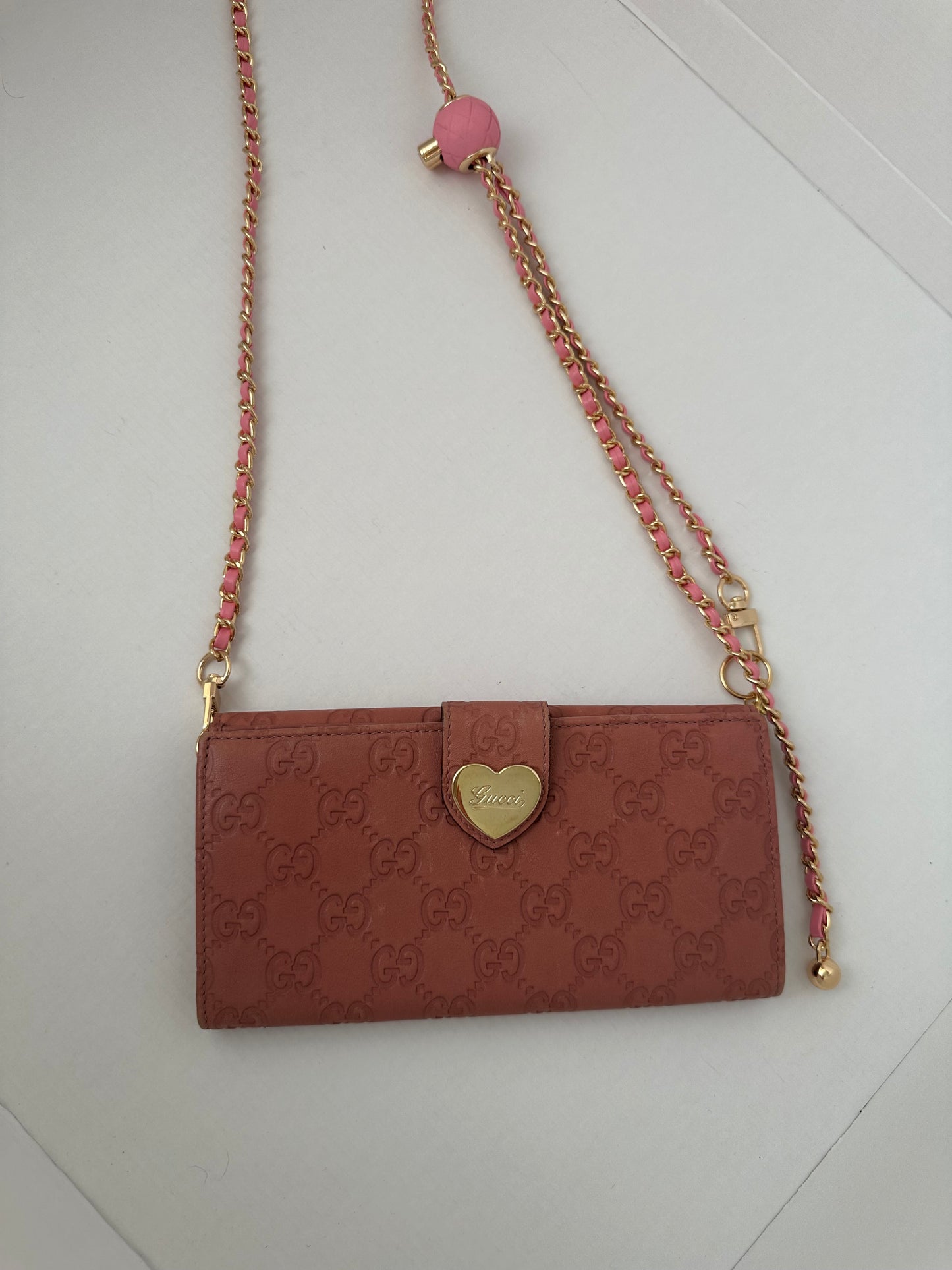 Gucci Guccissima pink leather monogram heart wallet