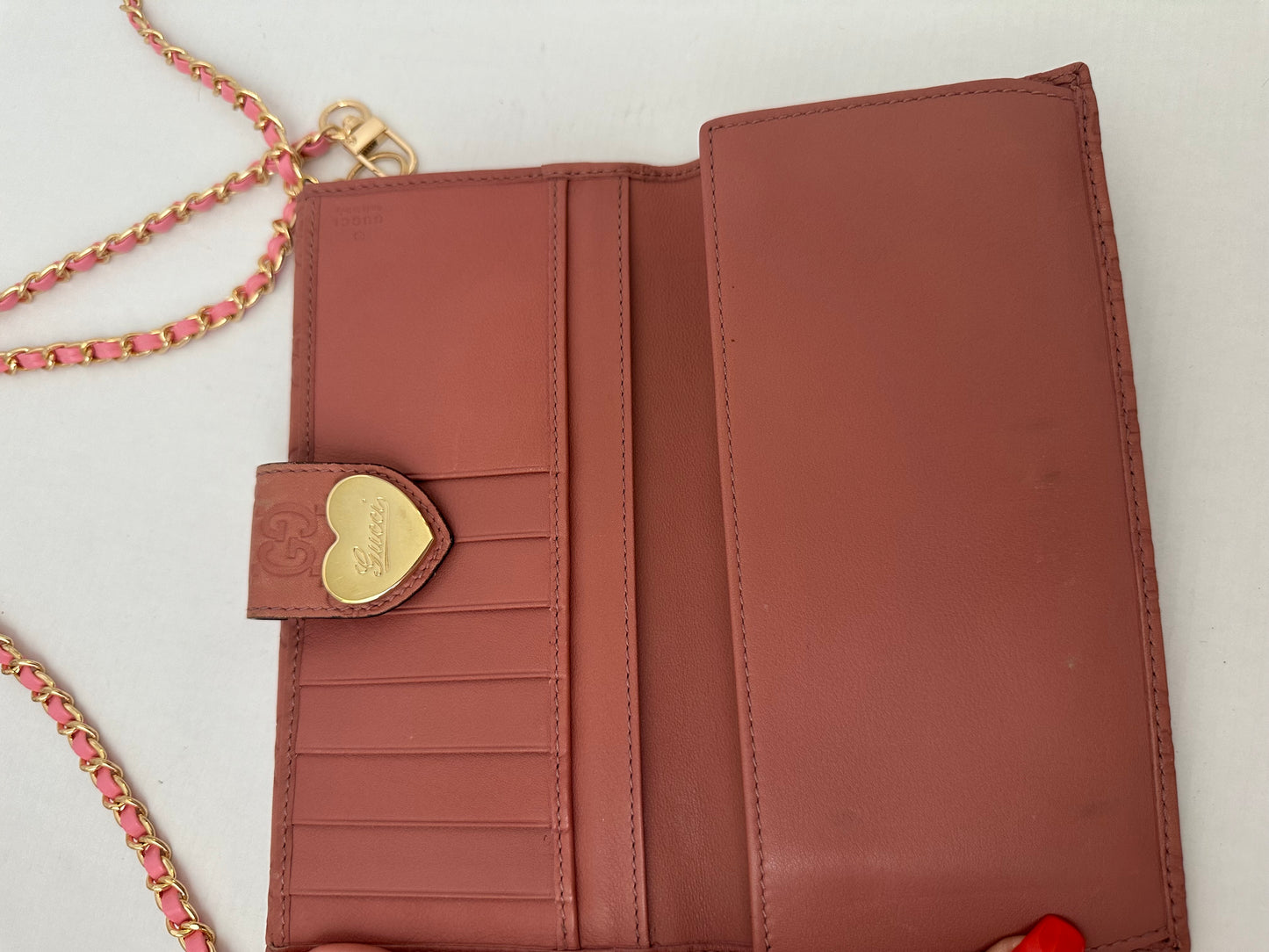 Gucci Guccissima pink leather monogram heart wallet