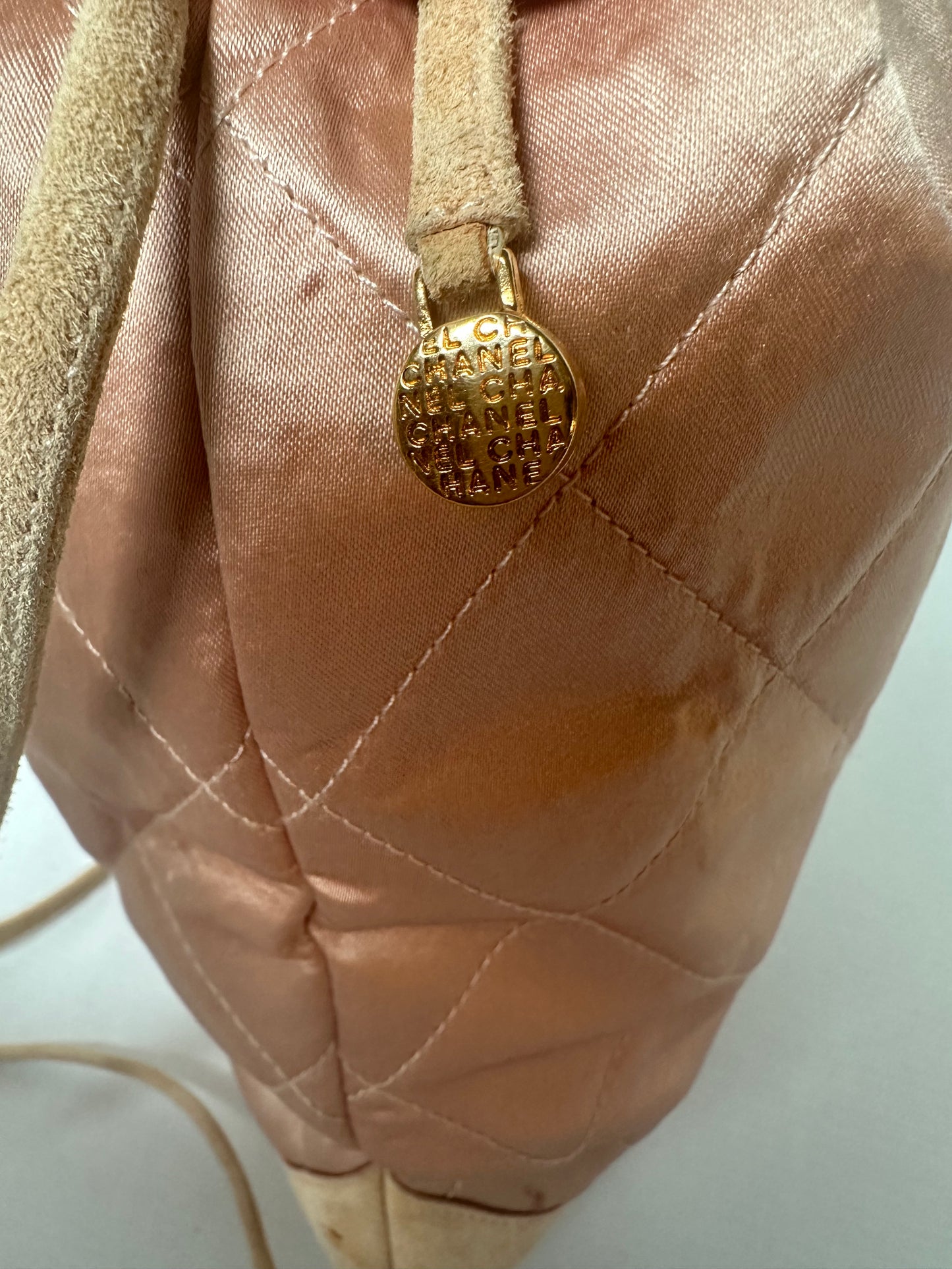 Available Chanel Vintage Quilted Satin and Suede Drawstring Backpack