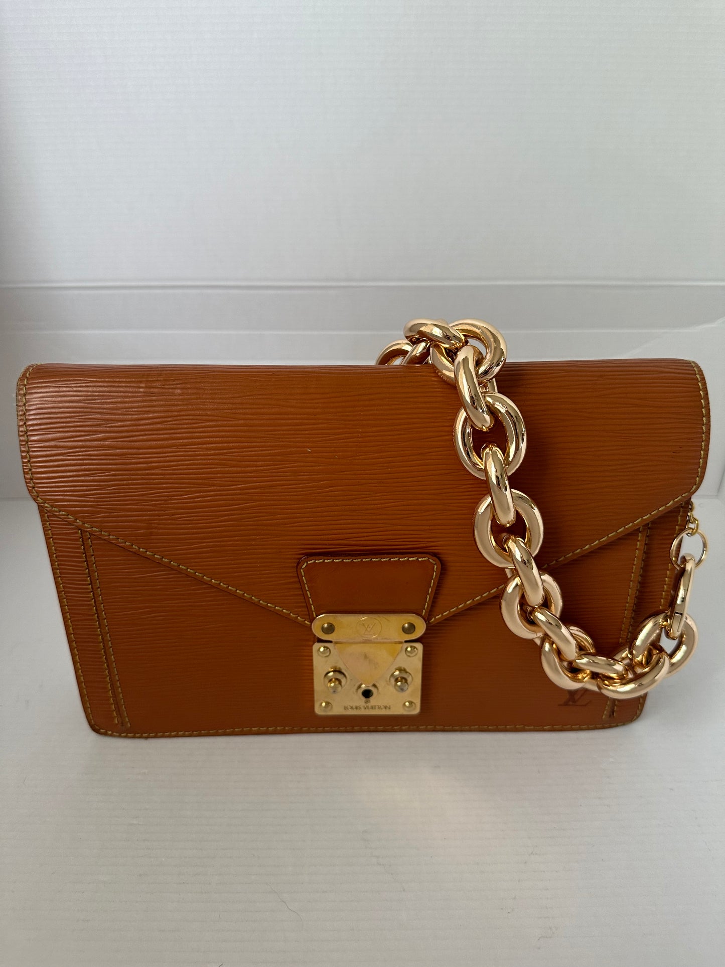 Available Louis Vuitton epi clutch ~ brown vintage