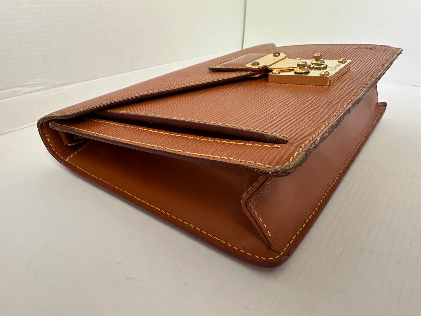 Available Louis Vuitton epi clutch ~ brown vintage