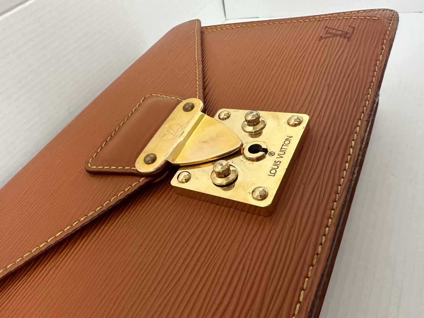 Available Louis Vuitton epi clutch ~ brown vintage