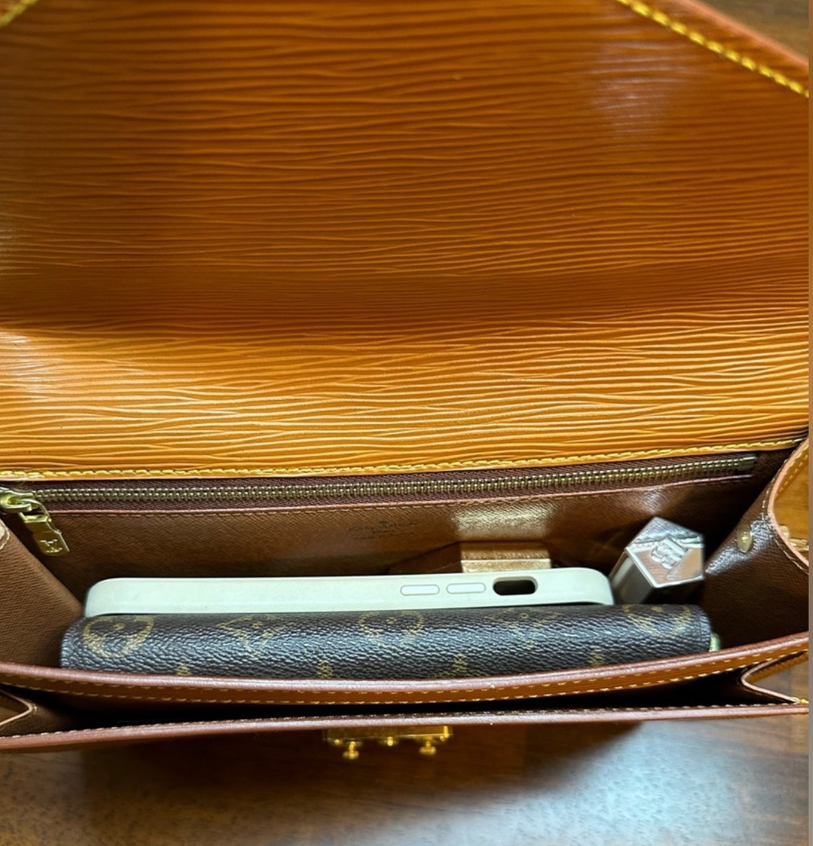 Available Louis Vuitton epi clutch ~ brown vintage