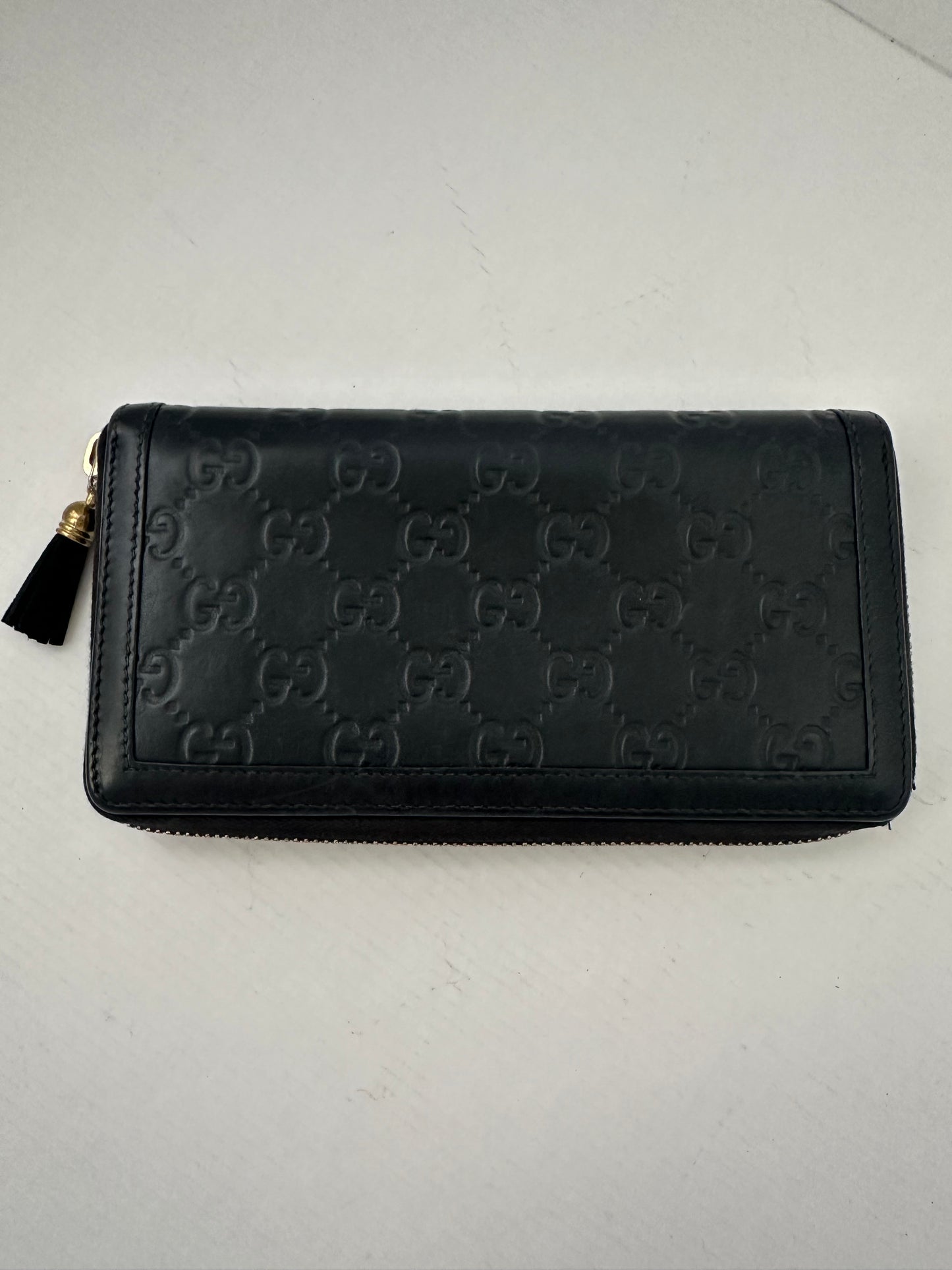 Gucci GG Leather zippy Wallet