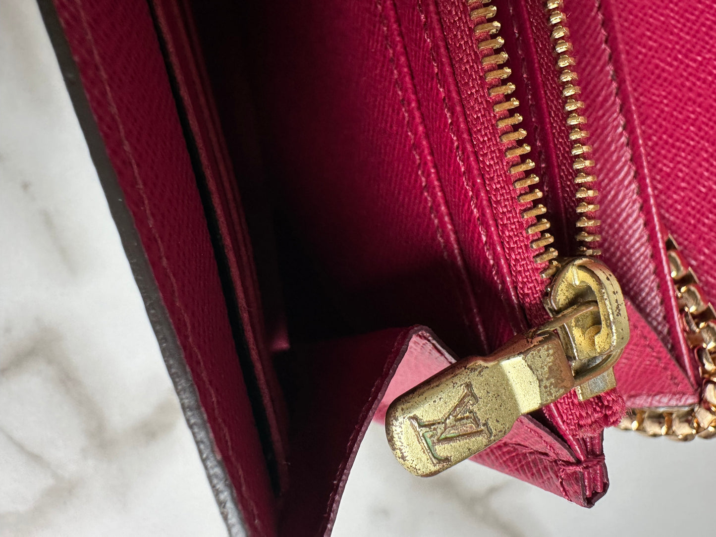Available Louis Vuitton Sarah Wallet on chain